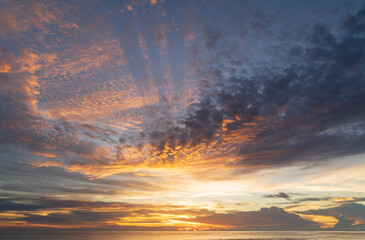 Abstract amazing Scene of stuning Colorful sunset with clouds background in nature and travel concept, wide angle shot Panorama shot.