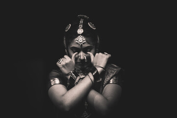 Bharatnatyam dancer closing eyes