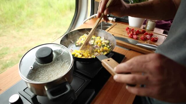 Cooking on a gas stove inside a caravan