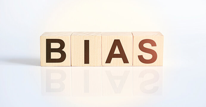 Wooden blocks with the word Bias. Preconception