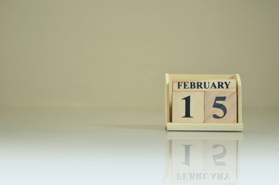 February 15, Number cube with the reflection on the ground.