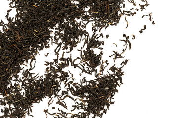 Leaves of black premium dry tea on a white background
