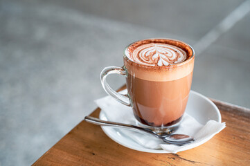 cup of cappuccino with cinnamon