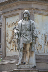 Obraz premium Milan, Italy – July 9, 2014: Details of monument of famous painter Leonardo and his journeymen near the Cathedral of Milano, at Milan’s historical downtown, Italy, summer time, details.
