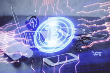 Double exposure of blockchain and crypto economy theme hologram and table with computer background. Concept of bitcoin cryptocurrency.