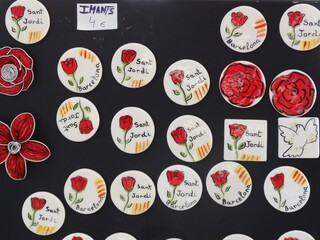 サン・ジョルディ（本の日）に贈る赤いバラの小物/The rose goods on Sant jordi - obrazy, fototapety, plakaty