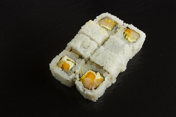 Japanese food: Set of salmon sushi and rolls with salmon and eel