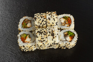 Japanese food: Set of salmon sushi and rolls with salmon and eel
