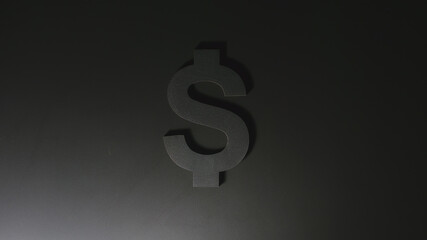 Fototapeta premium US Dollar symbol on a black background