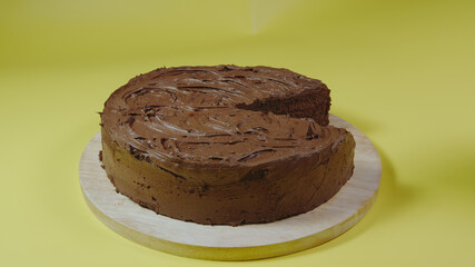 Chocolate cake without one piece - Side view