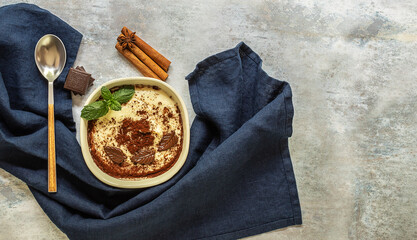 Phirni - sweet rice pudding - traditional Punjabi sweet dish with cinnamon and chocolate.