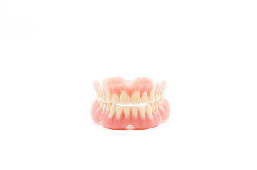 Dentures isolated on a white background. Denture, close up.