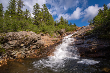 Beautiful waterfall in Hamar-Daban mountains