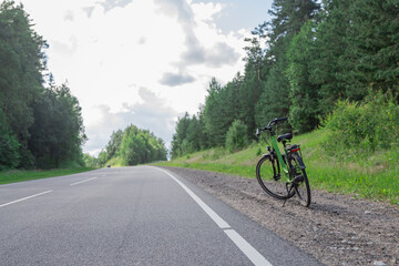 Bicycle outdoors in summer near the lake on the road