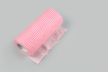 Rolled paper kitchen towels isolated on gray background