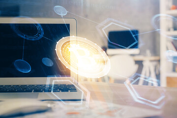 Multi exposure of blockchain theme hologram and table with computer background. Concept of bitcoin crypto currency.