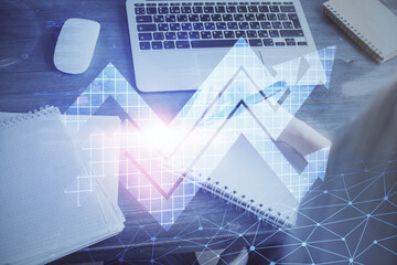 Blue arrow over woman's hands taking notes background. Concept of success. Double exposure