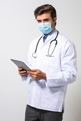 doctor with uniform and mask protection on white