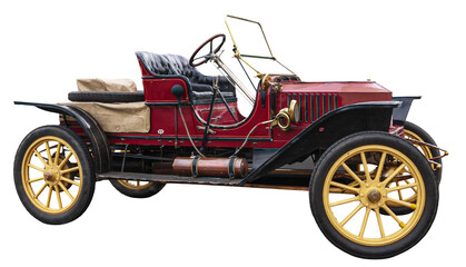 A red steam-powered vintage sports car from the early twentieth century. This old automobile has...