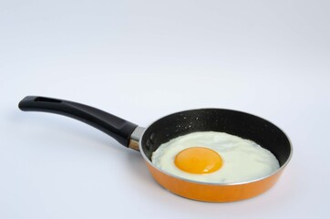 Fried egg in a small children's pan