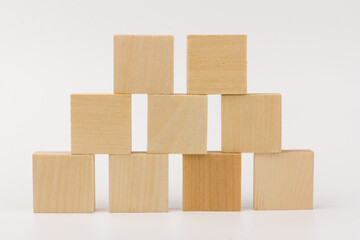 Wooden blocks to build a wall. Concept of new business, partnership, integration and startup