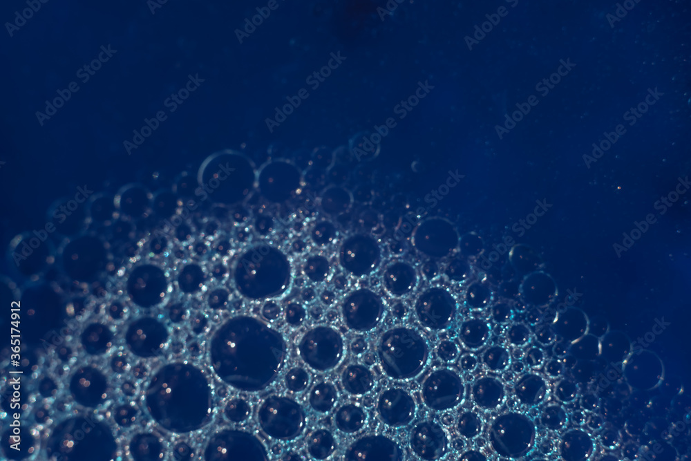 Poster Beautiful abstract blue bubbles background pattern texture for design . Macro view.