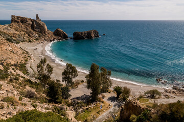 Fototapeta na wymiar Vista elevada de una cala de arena en la costa de Granada.