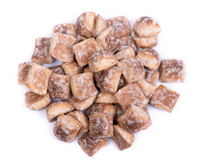 Heap of square gingerbreads in sugar glaze
