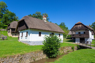 Fototapeta na wymiar Traditional buildings of wood and rock in the village of Kumrovec, Croatia