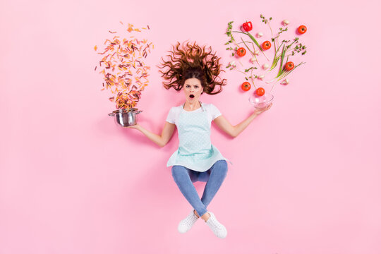 Oh no i cant prepare supper.Top above high angle full length photo of shocked girl housewife flat lay hold saucepan bowl fresh eco bio product vegetable fall isolated pastel color background