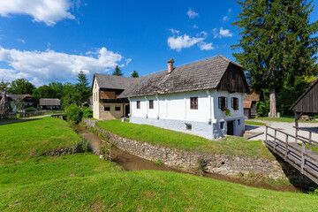 Fototapeta na wymiar Traditional buildings of wood and rock in the village of Kumrovec, Croatia