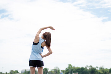 Woman stretch before exercise in the morning.