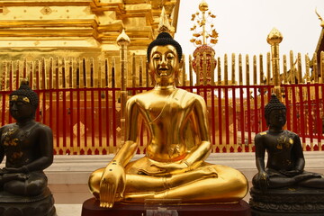 Buddha statue around the Golden pagoda PraThat Doi SuThep Chiang Mai province, Thailand.