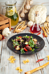 Warm salad with horsemeat pastrami baby potatoes