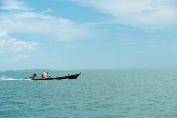 Coastal fishing boat Close to the island in the sea