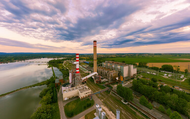 Obraz premium Power plant of Oroszlany city in Vertes hills Hungary next to Lake bokod where are the famous village floating on water. This is a fishing paradise.