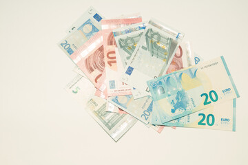 banknotes of european money lie on a white background