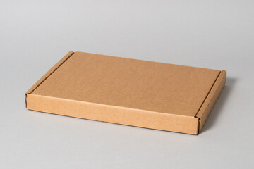 Flat brown cardboard carton boxes, isolated