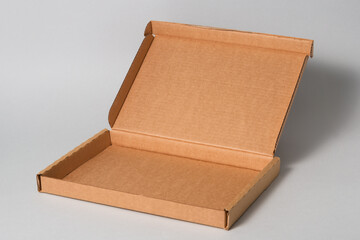 Flat brown cardboard carton boxes, isolated