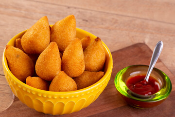traditional Brazilian fried snack made with chicken known as 
