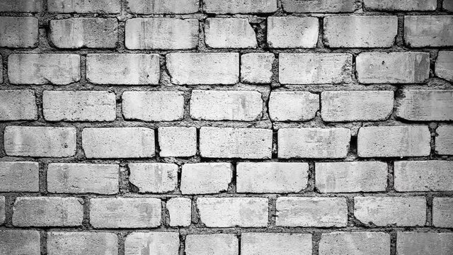 Vintage and dirty white brick wall background texture with smudges and cracks. dolly camera movement