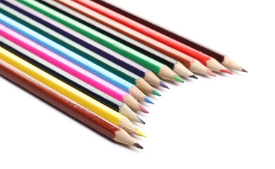 Colorful pencils set arrangement, row isolated on white background