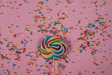 colorful lollipops with crumbs stock photo