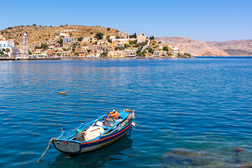 Fototapeta na wymiar The beautiful island of Symi with a turquoise bay. Dodecanese, Greece