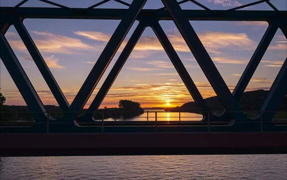 Time-lapse of the Danube River at sunset in Deggendorf, Germany 