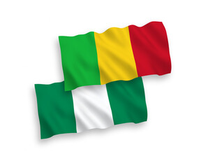 Fototapeta premium Flags of Mali and Nigeria on a white background