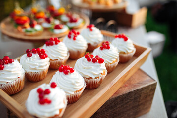 Selective focus cupcakes berries cream  catering