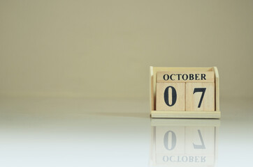 October 7, Number cube with the reflection on the ground.