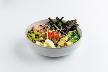 Isolated asian poke bowl with avocado roe nori 