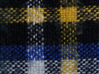 close up of a black and yellow fabric